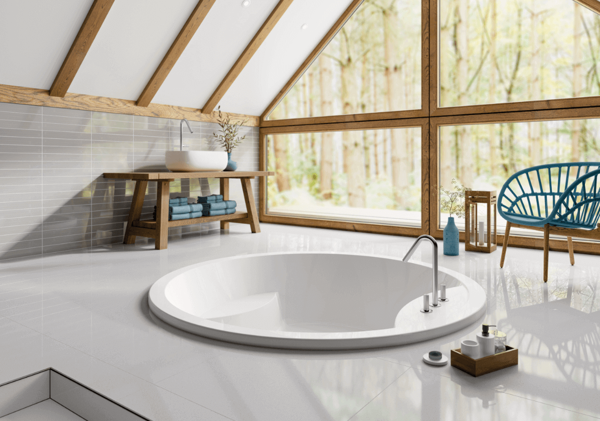 Oasis Inset bath in a white bathroom with large window